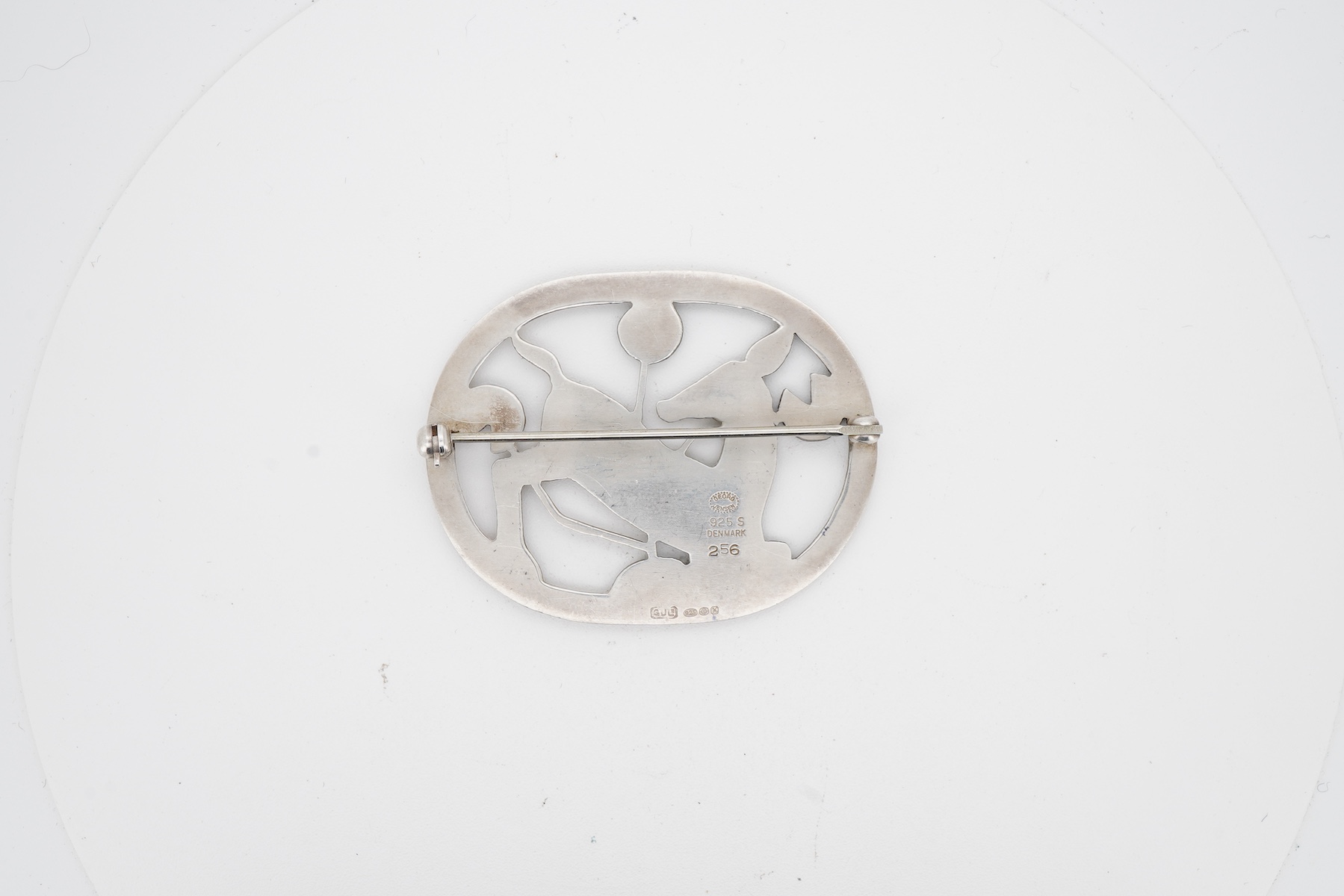 A Georg Jensen sterling kneeling deer oval brooch, design no. 256, 44mm.